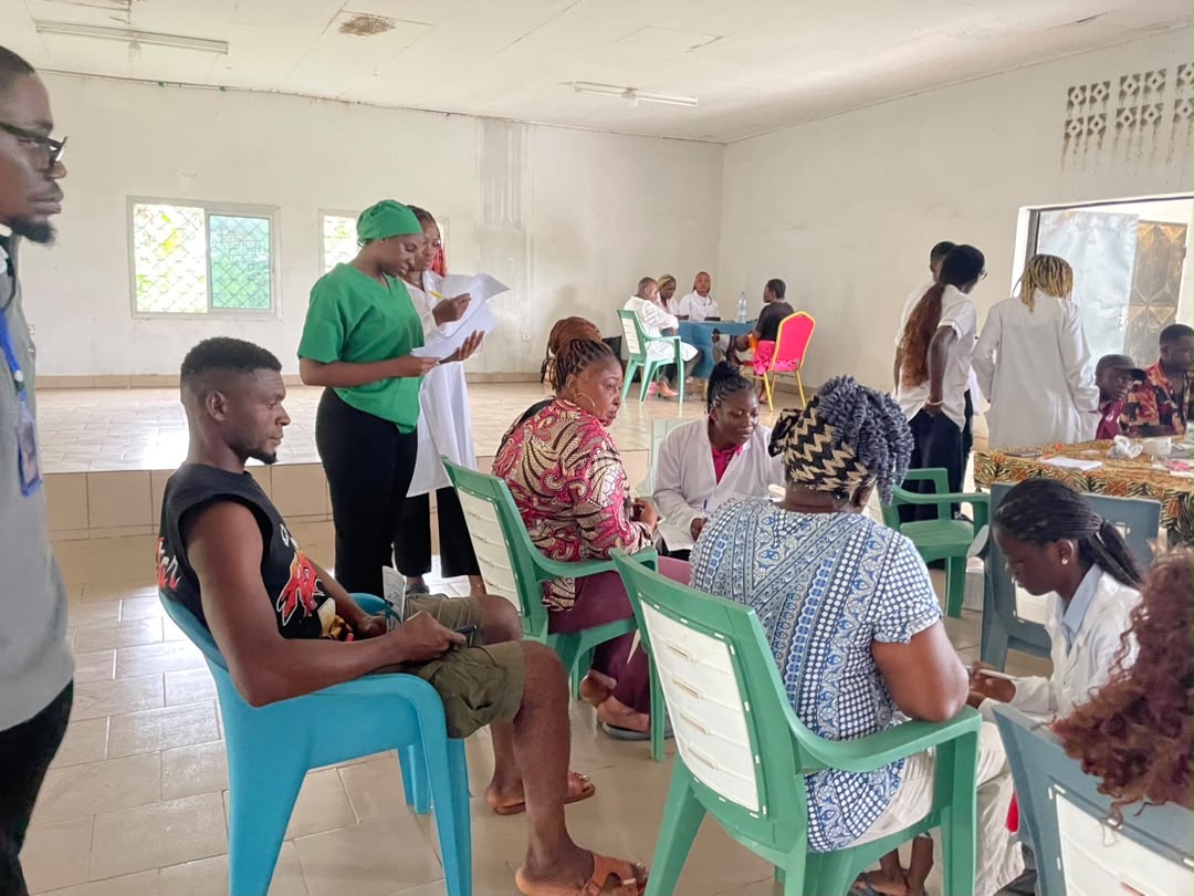 Medical volunteers attending to community members in Mokundange